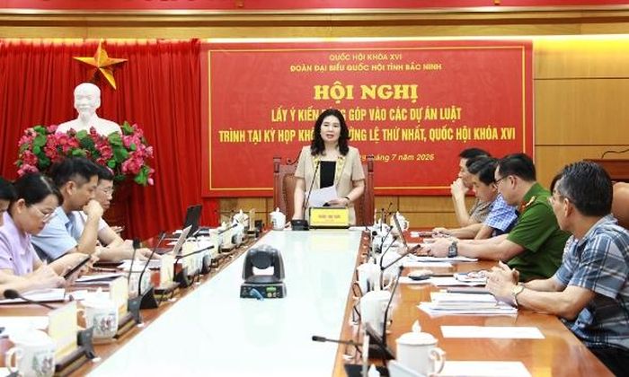 Các đại biểu tham dự hội nghị lấy ý kiến.