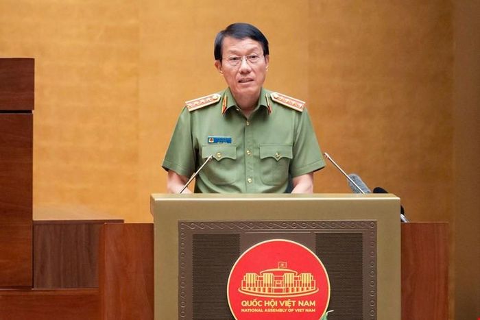 Bộ trưởng Bộ Công an Lương Tam Quang trình bày Nghị quyết về Chiến lược an ninh quốc gia. Ảnh: quochoi.vn