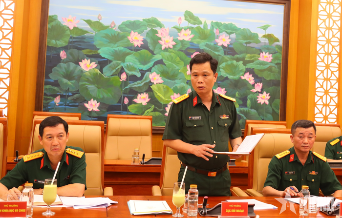 Đại tá Đặng Thanh Minh, Phó cục trưởng Cục Đối ngoại báo cáo tại buổi làm việc. 