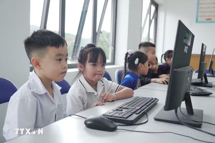 Học sinh Trường Phổ thông nội trú Tiểu học và THCS Trà Lĩnh. (Ảnh: Chu Hiệu/TTXVN)