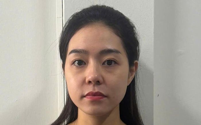Đối tượng Phạm Thị Kim Xuyến tại cơ quan công an - Ảnh: CACC
