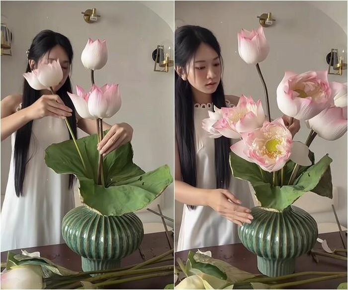 Các khoảng trống tiếp tục được lấp đầy bằng những bông sen nở vừa phải, đan xen với đài sen xanh và lá sen để tạo cảm giác tự nhiên, gần gũi nhưng vẫn sang trọng. Cuối cùng, cô lùi lại quan sát nhiều góc khác nhau rồi điều chỉnh từng cành hoa cho cân đối trước khi hoàn thiện.