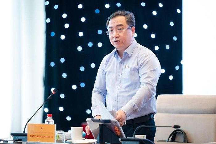Phó Chủ nhiệm Ủy ban Văn hóa và Xã hội Đặng Xuân Phương trình bày báo cáo tóm tắt thẩm tra dự án Luật Hòa giải ở cơ sở (sửa đổi)