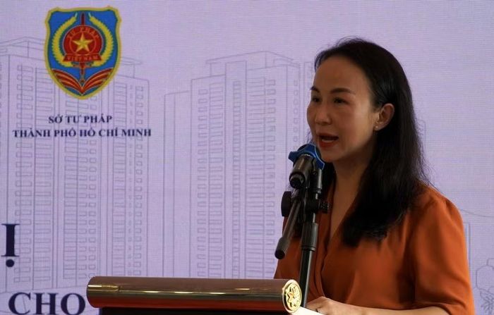 Bà Lê Thị Hoàng Thanh, Phó Cục trưởng Cục Pháp luật Dân sự-Kinh tế phát biểu. (Ảnh: LÊ ĐÌNH THÌN)