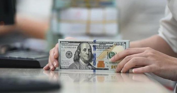 Ngân hàng niêm yết tỷ giá 20 ngoại tệ, USD bán ra 26.490 đồng. (Ảnh minh họa).