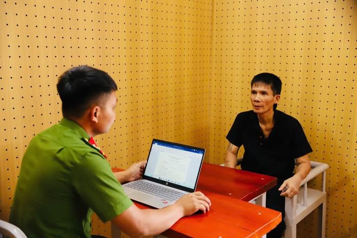 Nguyễn Văn Dũng tại cơ quan điều tra. Ảnh: CACC