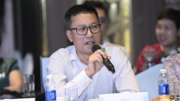 Luật sư Lê Quang Vinh, Giám đốc Công ty Sở hữu trí tuệ BROSS và cộng sự. Ảnh: Hoàng Anh