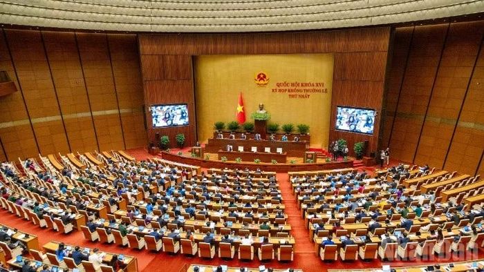 Quốc hội làm việc tại hội trường nghe Tờ trình và Báo cáo thẩm tra về Dự án Luật sửa đổi, bổ sung một số điều của Luật Trách nhiệm bồi thường của Nhà nước. (Ảnh: THỦY NGUYÊN)