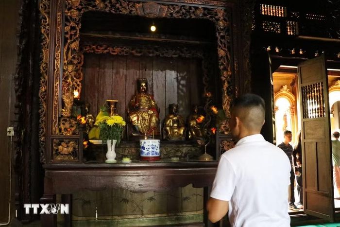 Chùa Vĩnh Tràng vừa là điểm hành hương, vừa là điểm du lịch thu hút du khách. (Ảnh: Hồng Thái/TTXVN)