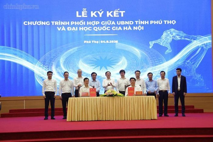 Phó Thủ tướng Hồ Quốc Dũng và các đại biểu chứng kiến ký kết chương trình phối hợp giữa UBND tỉnh Phú Thọ và Đại học Quốc gia Hà Nội - Ảnh: VGP/Gia Huy