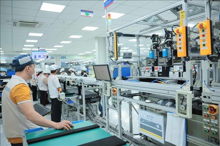 Việc cải thiện môi trường đầu tư kinh doanh tiếp tục là yêu cầu then chốt để thu hút vốn FDI. Ảnh minh họa: TTXVN