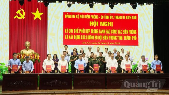 Đảng ủy Bộ đội Biên phòng phối hợp với 30 tỉnh ủy, thành ủy có biên giới ký kết quy chế phối hợp - Ảnh: Q.V