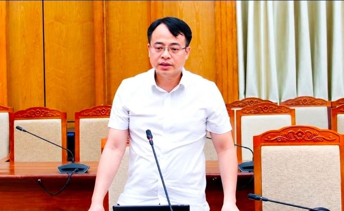 Ông Nguyễn Văn Dũng tại một cuộc họp trước khi bị khởi tố, bắt tạm giam.