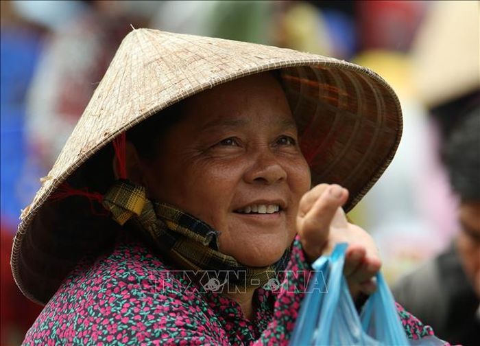 Nụ cười với ánh mắt hy vọng nơi khu chợ.