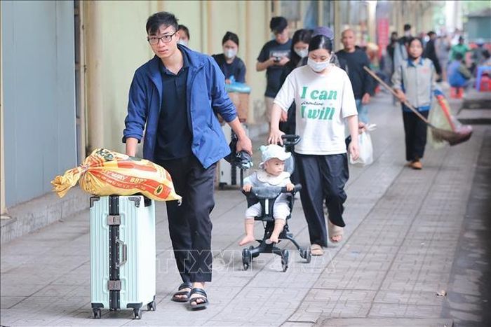 Hành khách tại Bến xe Mỹ Đình. Ảnh minh họa: Lê Đông/TTXVN