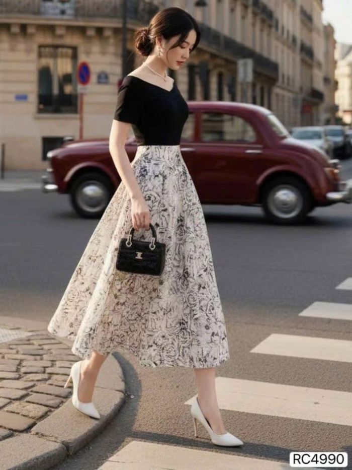 Váy họa tiết nhẹ nhàng tạo điểm nhấn cho trang phục công sở. (Ảnh: Pinterest)