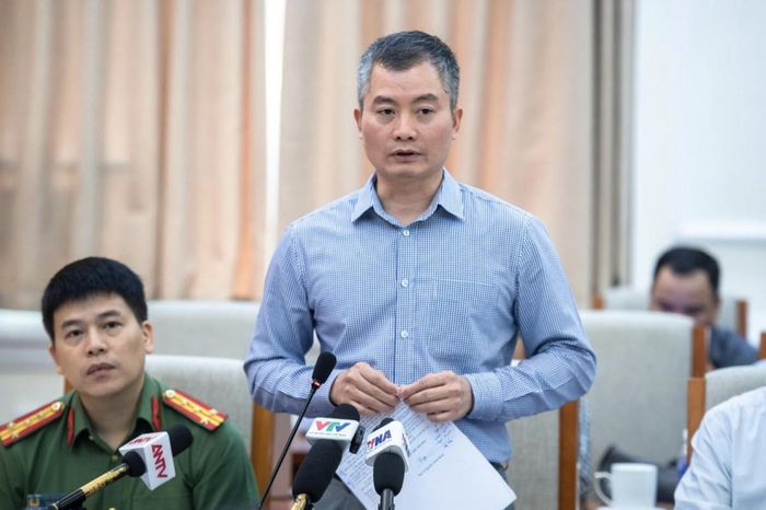 Đại tá Vũ Tuấn Hưng, đại diện Bộ Công an thông tin tại họp báo. Ảnh DV