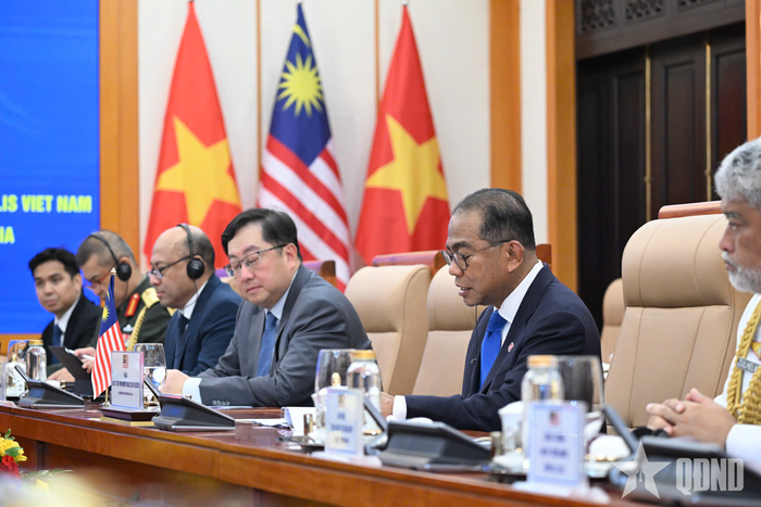  Bộ trưởng Dato' Seri Mohamed Khaled bin Nordin và các thành viên đoàn Malaysia tại hội đàm. Ảnh: TRỌNG HẢI 