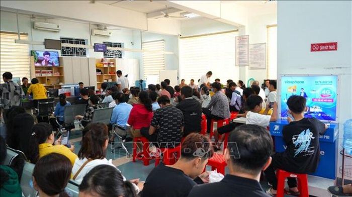 Người dân đến làm căn cước công dân tại Trung tâm phục vụ hành chính công tỉnh Tây Ninh. Ảnh: Minh Phú/TTXVN