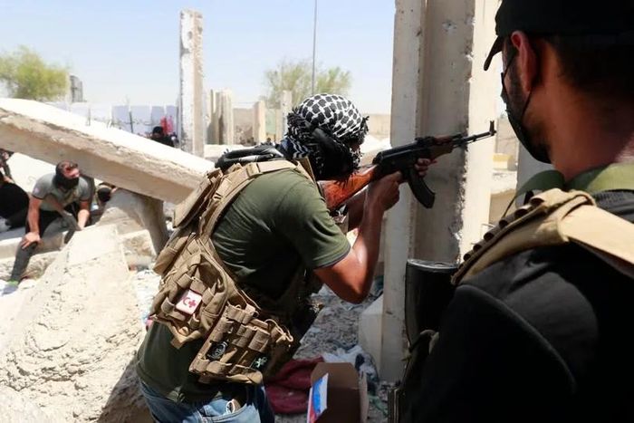 Liên minh cầm quyền Iraq cảnh báo các nhóm vũ trang hoạt động ngoài sự kiểm soát của nhà nước sẽ phải đối mặt với các biện pháp xử lý theo Luật Chống khủng bố. Ảnh: Al Jazeera.