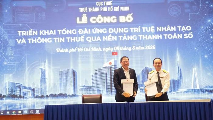 Ký kết biên bản ghi nhớ hợp tác giữa Thuế Thành phố Hồ Chí Minh và Ngân hàng Thương mại Cổ phần Á Châu (ACB). (Ảnh: Lê Tú)