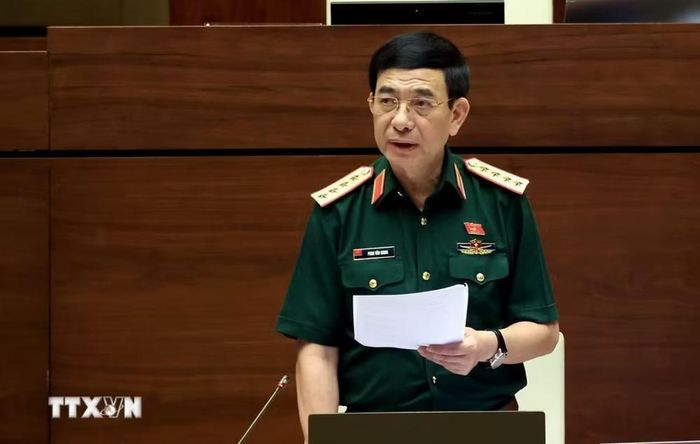 Đại tướng Phan Văn Giang, Ủy viên Bộ Chính trị, Phó Thủ tướng Chính phủ, Bộ trưởng Bộ Quốc phòng phát biểu giải trình, làm rõ một số vấn đề đại biểu Quốc hội nêu. (Ảnh: Tuấn Anh/TTXVN)