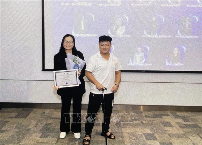 Lê Tấn Đạt tham dự sự kiện cố vấn công nghệ thông tin tại trường Đại học RMIT, thành phố Hồ Chí Minh. Ảnh: TTXVN phát