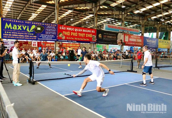 Các VĐV thi đấu nội dung đôi nam.