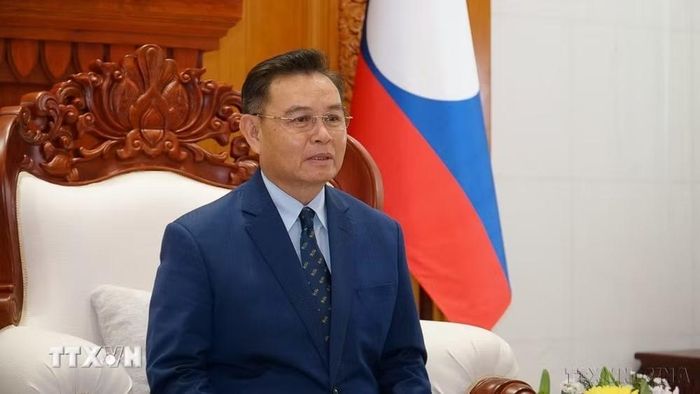 Chủ tịch Quốc hội Lào Xaysomphone Phomvihane trả lời phỏng vấn Phóng viên TTXVN tại Lào về quan hệ hợp tác giữa hai Quốc hội (2022). (Ảnh: TTXVN)