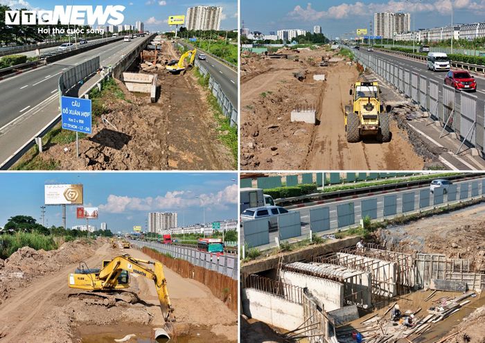 Tại khu vực đường dẫn từ cầu vượt Đỗ Xuân Hợp hướng về đường Vành đai 2, các nhà thầu đang triển khai thi công nền móng và cấp phối đá dăm.