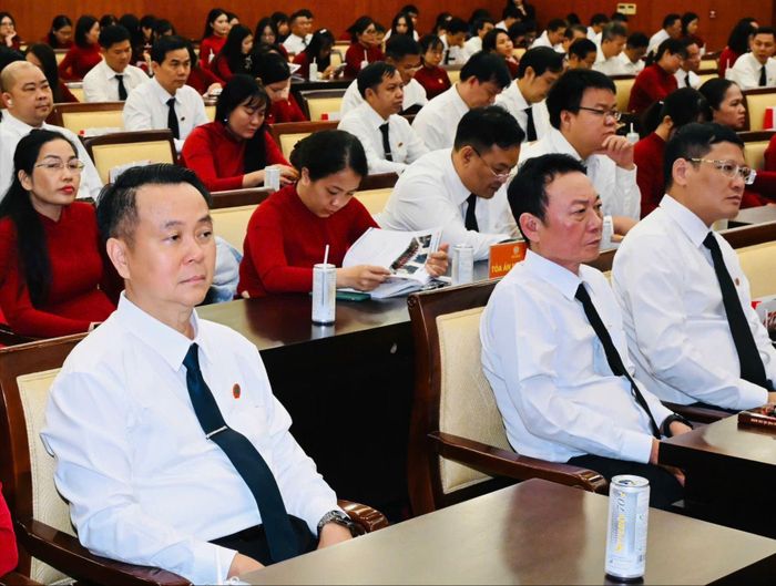  Các đại biểu ôn lại chặng đường 50 năm xây dựng và phát triển của TAND TPHCM. Ảnh: VIỆT DŨNG 