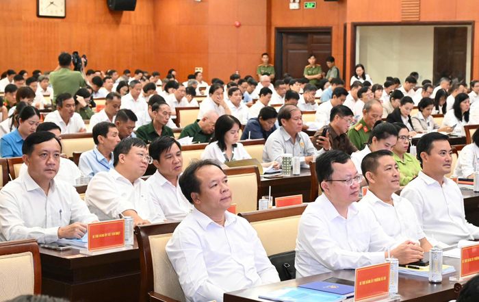 Các đại biểu dự hội nghị tại điểm cầu trực tiếp. Ảnh: VIỆT DŨNG