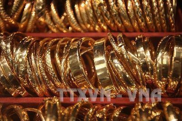 Giá vàng đi ngang sau khi ghi nhận tuần tăng mạnh nhất kể từ tháng 1/2026 . Ảnh: AFP/TTXVN
