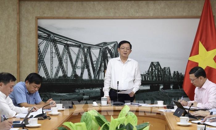 Phó Thủ tướng Hồ Quốc Dũng họp về đơn giản hóa thủ tục xuất khẩu sầu riêng. Ảnh: TTXVN