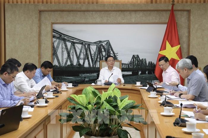 Phó Thủ tướng Hồ Quốc Dũng họp về đơn giản hóa thủ tục xuất khẩu sầu riêng. Ảnh: TTXVN