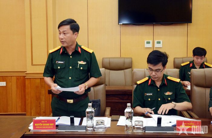 Đại tá Nguyễn Quang Huy, Trưởng ban Thanh niên Quân đội báo cáo kết quả công tác chuẩn bị tại hội nghị.