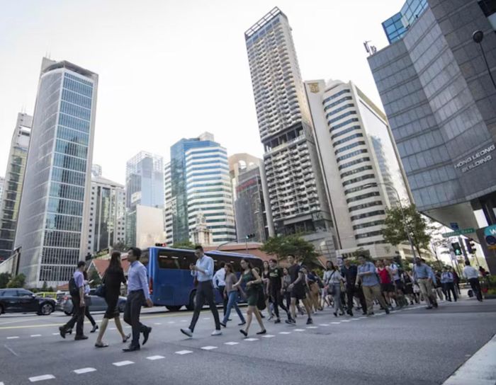 Người lao động tại Singapore. Ảnh: CNA/ISTOCK