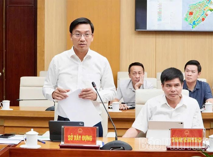 Giám đốc Sở Xây dựng Nguyễn Xuân Quang phát biểu tại hội nghị.