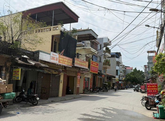 106 hộ dân thôn Tiền Phong đang lo lắng và băn khoăn về phương án phải nộp tiền sử dụng đất theo đơn giá của năm 2026 để được cấp "sổ đỏ". Ảnh: PV