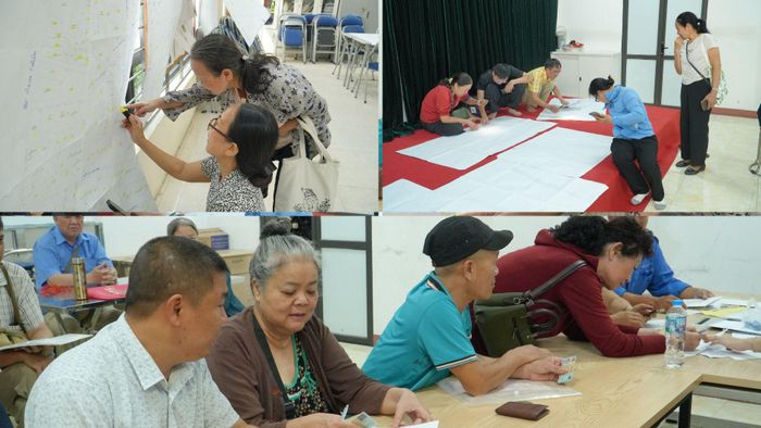 Người dân tại các tổ dân phố trên địa bàn phường Thanh Xuân được hướng dẫn rà soát, đối chiếu và cập nhật dữ liệu đất đai. Ảnh: Tùng Lâm