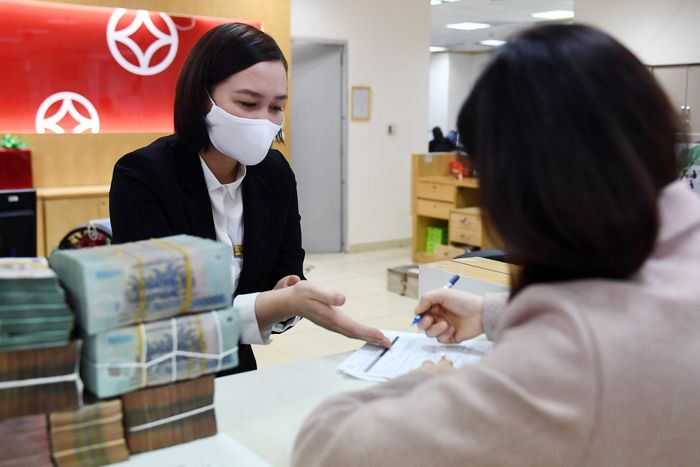  Dòng vốn rẻ đang hướng đến doanh nghiệp nhỏ và vừa, doanh nghiệp và cá nhân sản xuất kinh doanh trong các lĩnh vực ưu tiên, động lực tăng trưởng kinh tế. Ảnh: Nam Khánh. 