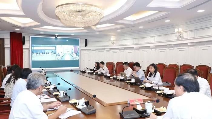 Hai bên trao đổi kinh nghiệm về hoạt động của Tòa án chuyên biệt. (Ảnh: MAI ĐỈNH)