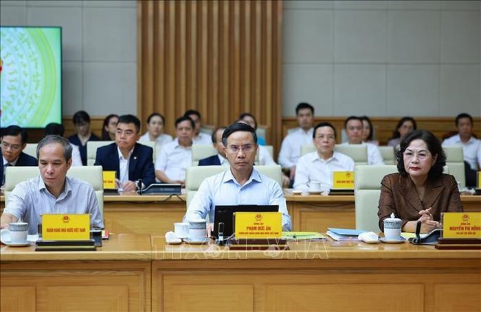 Lãnh đạo Quốc hội và Ngân hàng Nhà nước tham dự buổi làm việc. Ảnh: Dương Giang/TTXVN