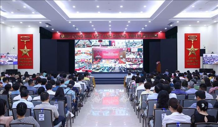 Đảng viên thuộc Đảng bộ Thông tấn xã Việt Nam tham dự Hội nghị trực tuyến tại điểm cầu trụ sở Thông tấn quốc gia (số 5 Lý Thường Kiệt, Hà Nội). Ảnh: Văn Điệp/TTXVN
