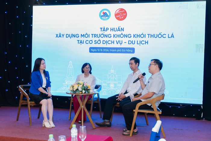 Chia sẻ kinh nghiệm về thực hiện môi trường không khói thuốc.  Ảnh: Phượng Hoàng
