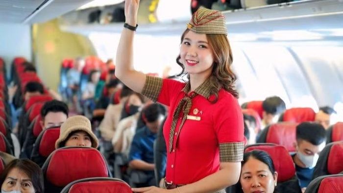 Hành khách trên chuyến bay Vietjet. (Ảnh: BẢO VY)