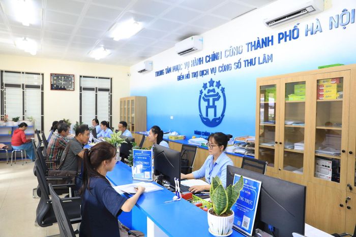 Cùng với phân cấp, Hà Nội đang đẩy mạnh đổi mới phương thức điều hành trên nền tảng số. Ảnh: Trung Nguyên.