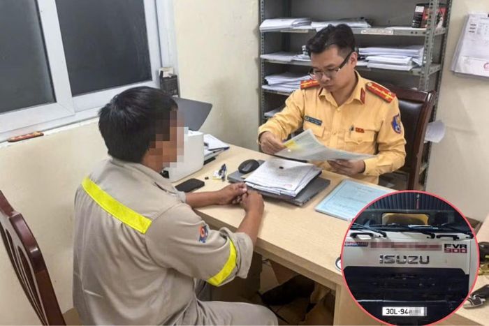 CSGT lập biên bản xử lý đối với tài xế xe bồn vi phạm.