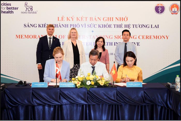 Các đại biểu chứng kiến hợp tác giữa 3 bên. Ảnh: Trang Phan