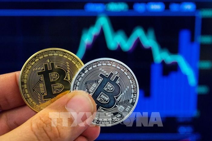 ETF bitcoin giao ngay – yếu tố thay đổi cuộc chơi trên thị trường tiền số. Ảnh: AFP/TTXVN
